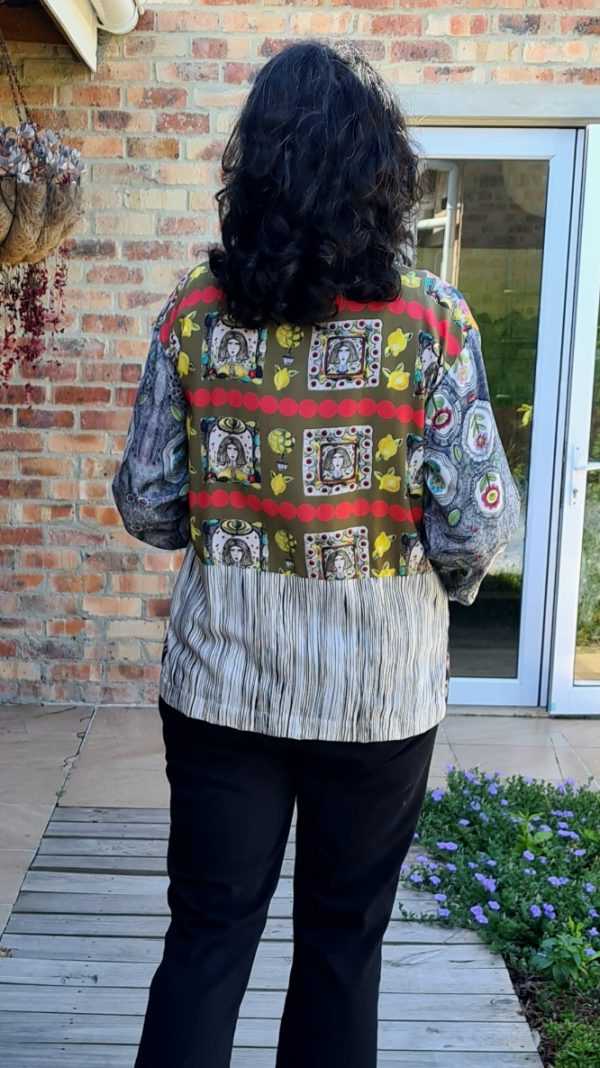 patchwork cardigan designer jacket, back view on model